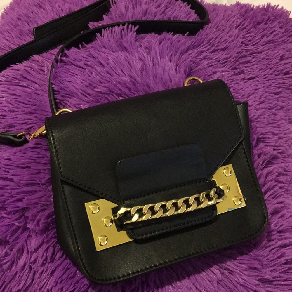 Cute gold/black handbag